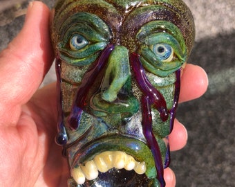 Monster face glass pipe