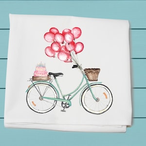 aniversário, toalha de saco de farinha, bicicleta com bolo de aniversário e balões, entrega de bicicleta, presente para ela