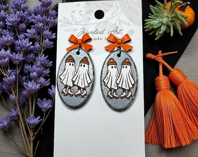 Hand-Painted Ghosts on Roller Skates Wood Engraved Earrings with Orange Bow – Spooky Season