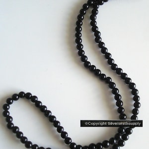 Natural black onyx 4mm round bead 16&quot; strand 100 beads per strand BS097