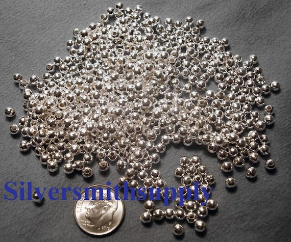 Bead, sterling silver, 3mm seamless round. Sold per pkg of 50. - Fire  Mountain Gems and Beads