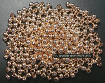 Lt Rose Gold plated 2.4mm (approximately) round spacer beads 1000 pc lot FPB183C
