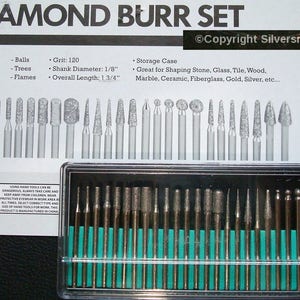 May include: A set of 30 diamond burrs in a clear plastic case. The burrs are assorted shapes, including balls, cones, cylinders, and flames. The burrs are 1/8 inch in diameter and 1 3/4 inches long. The burrs are grit 120 and are great for shaping stone, glass, tile, wood, marble, ceramic, fiberglass, gold, silver, and more.