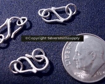 May include: Three silver-toned metal clasps for jewelry making, shown next to a US dime for size comparison.  ©Copyright Silversmithsupply
