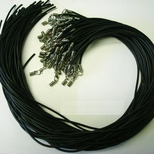May include: A bulk pack of black elastic cord necklace chains with silver spring ring clasps.