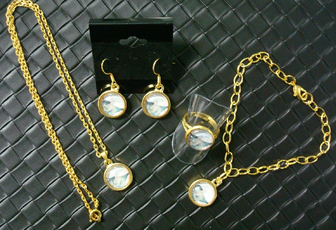 Fashion Collier + Bracelet + Boucles D'Oreilles + Bague Couleur Or