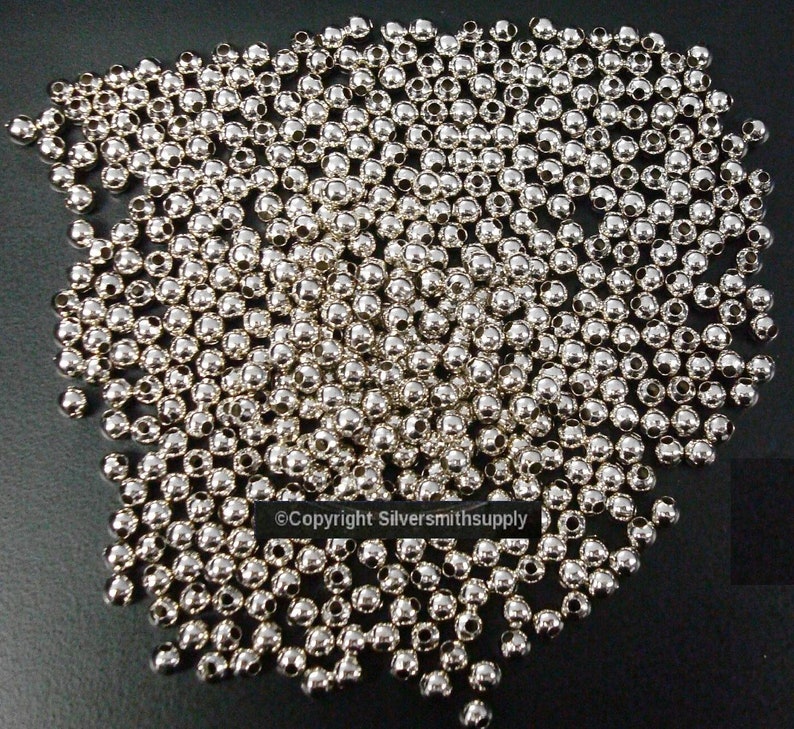 18kt White gold plated 4mm round spacer beads fpb087 18kt White gold plated 4mm round spacer beads fpb087