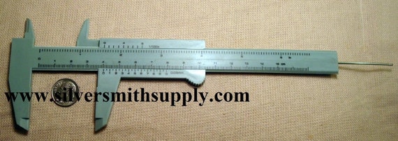 Plastic 7 inch Ruler with Millimeters and Inches mm in Metal
