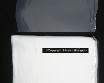 May include: Two clear plastic bags, one on top of the other. The top bag is slightly smaller than the bottom bag. The bottom bag is white and has the text "©Copyright Silversmithsupply" printed on it.