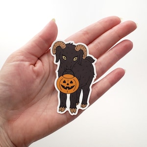 Trick-or-Treat Goat vinyl sticker // goat holding jack-o-lantern bucket // weatherproof