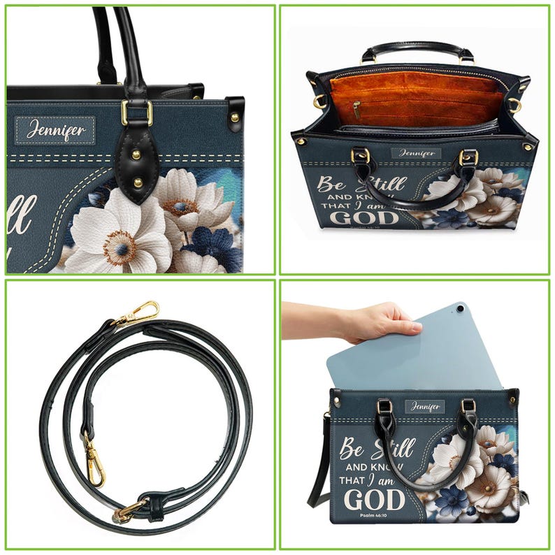 Puede incluir: Un bolso tote azul con un dise&ntilde;o floral y el texto "Be Still and Know that I am God" impreso en la parte delantera. El bolso tiene un asa superior y una correa de hombro desmontable.