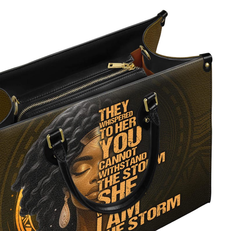 Top view of personalized empowerment leather handbag showing secure zippered compartments and roomy design. Faux leather construction with custom Black woman design and “I Am The Storm” quote. Functional and stylish tote for carrying essentials. Perfect gift for women who value fashion and empowerment, ideal as Christmas or Mother’s Day present.