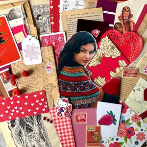 May include: A collage of vintage ephemera in shades of red, pink, and cream. Includes a playing card with a superhero illustration, a heart-shaped doily, and a portrait of a woman. Various paper scraps, stickers, and illustrations are scattered throughout.