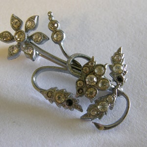 Vintage 1940&#39;s silver tone and rhinestone flower brooch made in Czechoslovakia