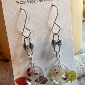 Fabulous dangle earrings with artisan wires, vintage silver findings, and vintage murano glass beads