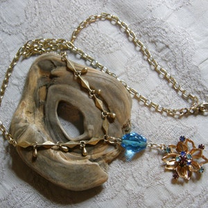 Artisan crafted assemblage necklace from vintage findings.