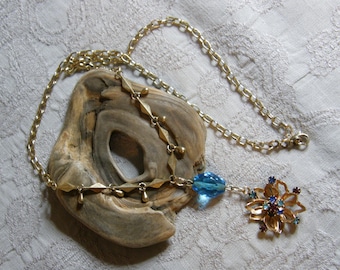 Artisan crafted assemblage necklace from vintage findings.