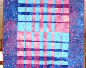 Quilted Wall Hanging -- Woven strips of Blue and Purple with "Galaxy" Blue Border Fabric