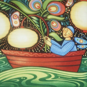 May include: A man in a blue shirt sits in a red boat with a green and black floral design. The boat is floating on green water. The man is holding a green stem with flowers.