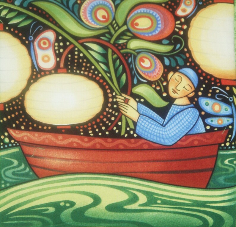 May include: A man in a blue shirt sits in a red boat with a green and black floral design. The boat is floating on green water. The man is holding a green stem with flowers.