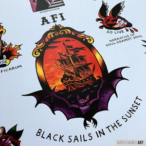 May include: A print with traditional tattoo designs. The central image is a ship sailing on a stormy sea, framed by a bat. The text "BLACK SAILS IN THE SUNSET" is below the image. Other tattoo designs and text are also visible.