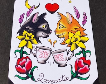 May include: A whimsical illustration of two cats, one black and one orange, sharing a cup of tea. The cats are surrounded by flowers and hearts, with the words "Lovecats" written below them.