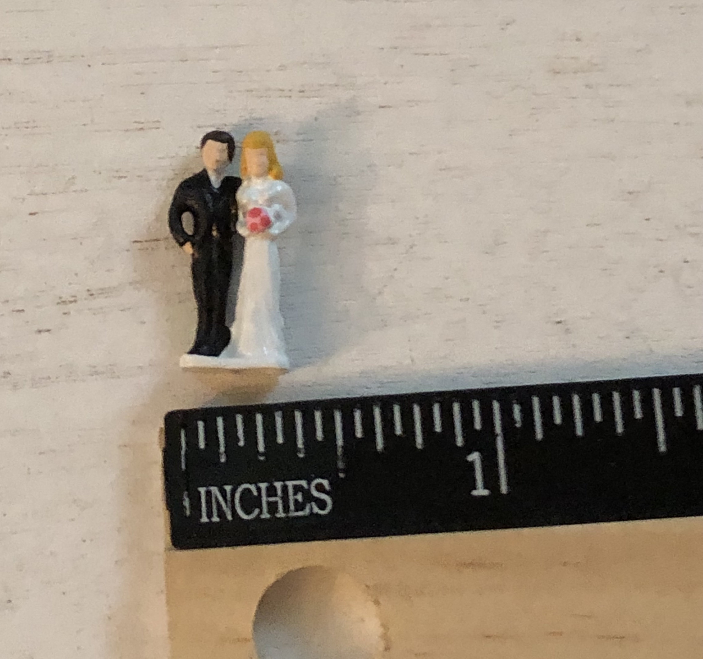tiny bride and groom figurines