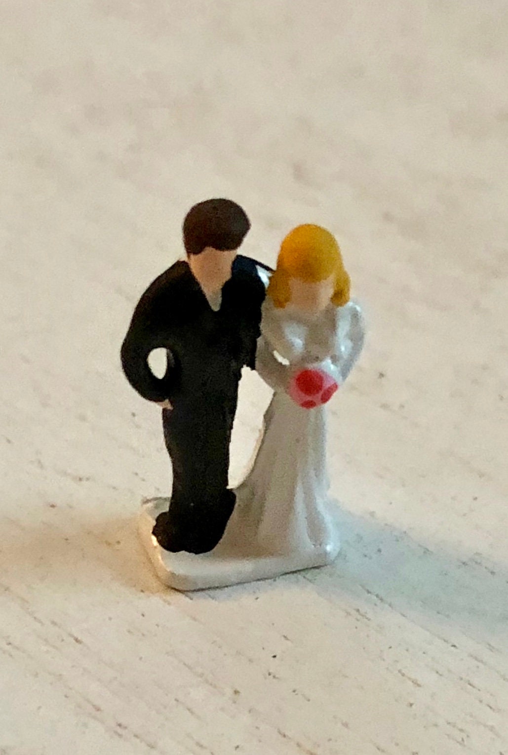 tiny bride and groom figurines