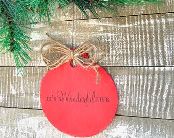 Wood ornament~ It’s a wonderful life. Size is 3X3 recieve a free mini magnet with your order. Twine bow, ready to hang.