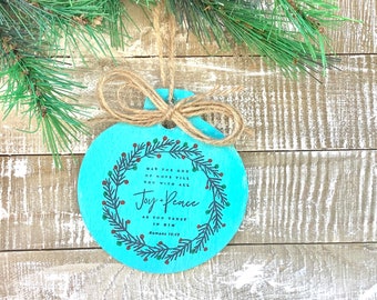 Wood ornament~ Joy and peace . Size is 3X3 recieve a free mini magnet with your order. Twine bow, ready to hang.