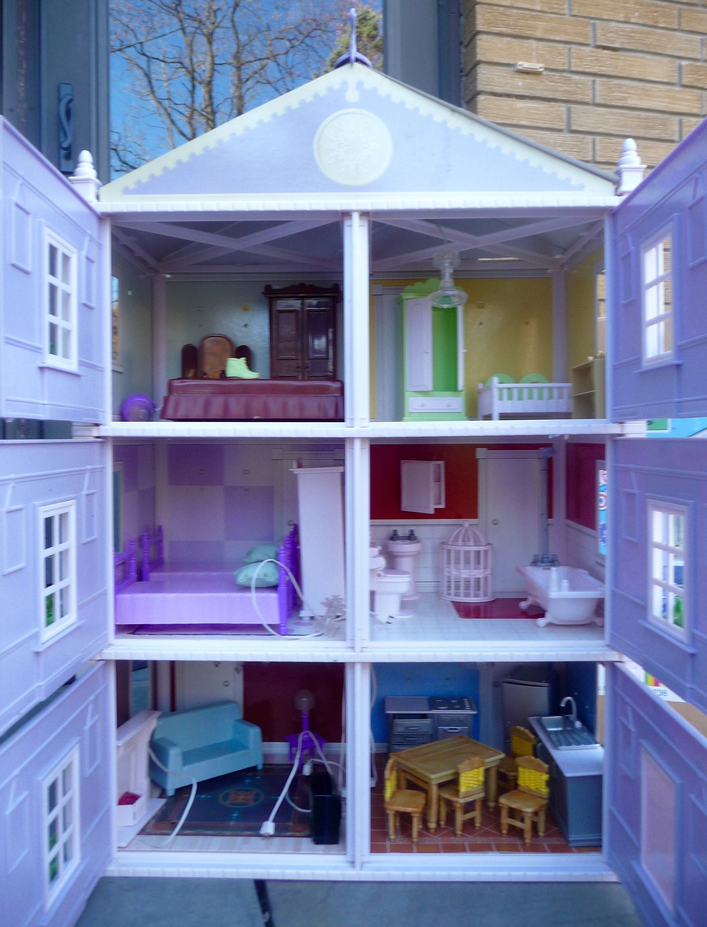 Greenwich dollhouse shop moves to larger space