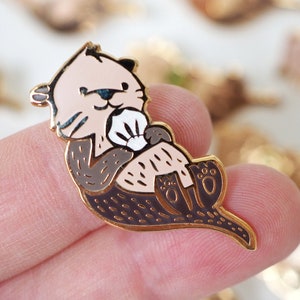 Lapel Pin White Shell Sea Otter Enamel Pin Pinback Button image 1