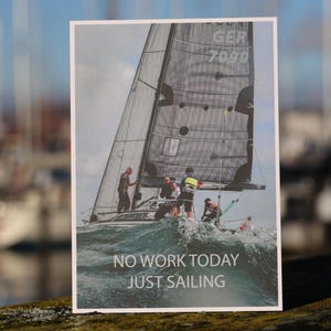 Postcard with sailboat and saying