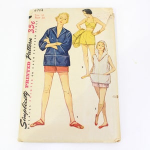May include: Simplicity Printed Pattern 4714, a vintage sewing pattern for a sleeveless top, shorts, and a jacket. The pattern is printed on cream-coloured paper with illustrations of three women wearing the garments.