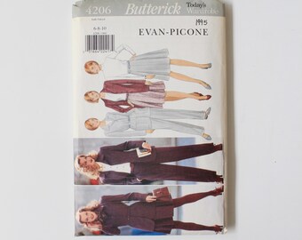 May include: A vintage Butterick sewing pattern envelope featuring illustrations of women's clothing designs. The envelope includes the text "4206 Butterick Today's Wardrobe 1995 EVAN-PICONE" and size information.