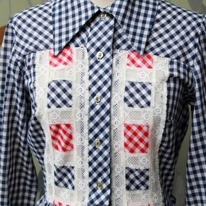1970s blue white gingham check button up shirt dress with large collar, red and white contrast check patchwork squares and lace border on front, gathered skirt, long sleeves coastal cowgirl