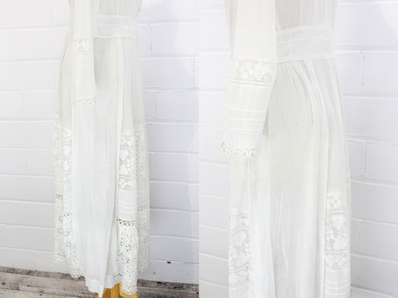 edwardian cotton lawn dress with ruffle collar, loop embroidered trim on sleeves and v neckline, floral embroidered skirt, long sleeves, maxi length, hooks and eyes closure  antique bridal dress