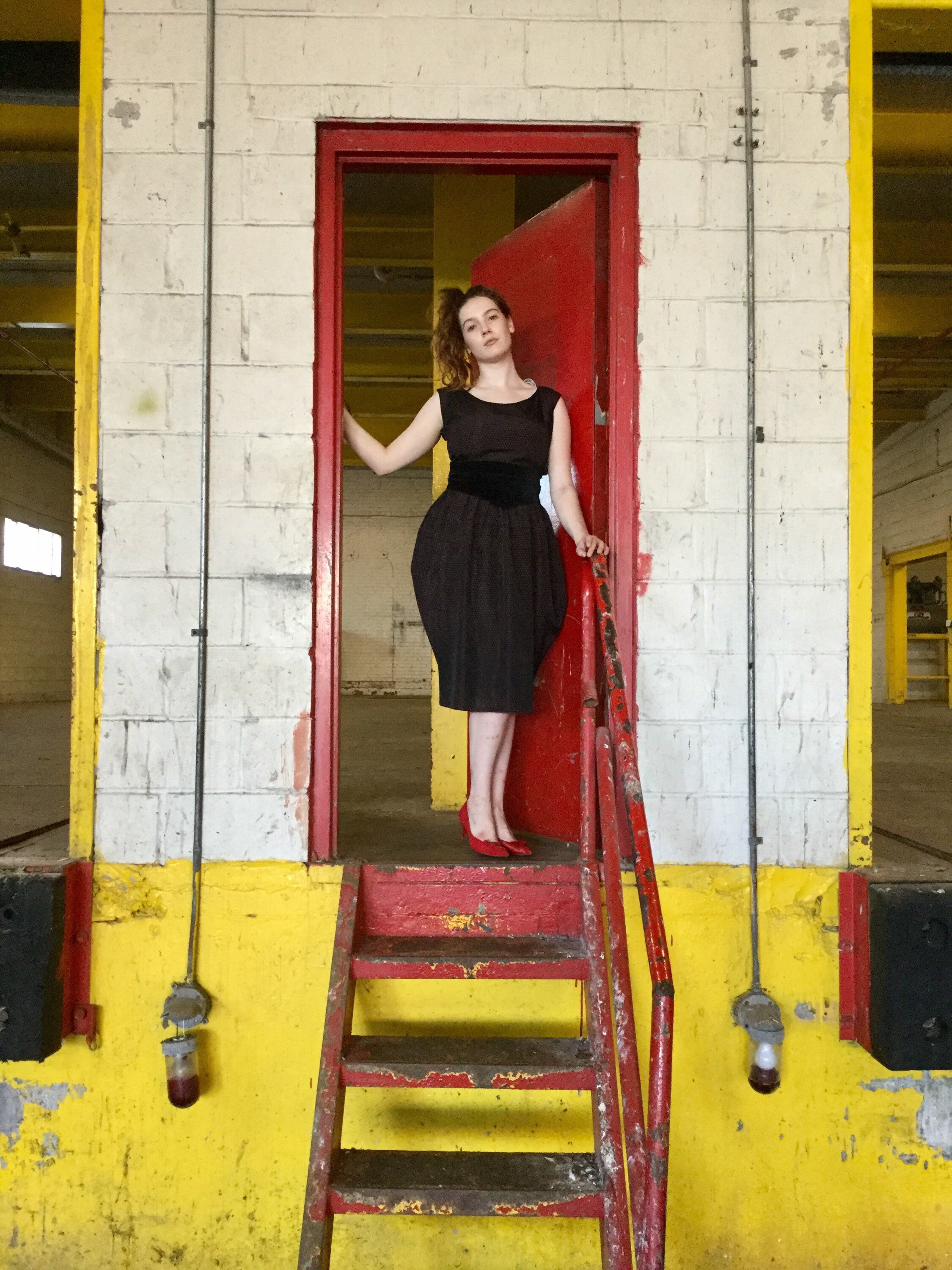 black dress with red underlay