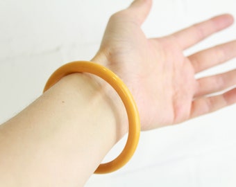 1940年代のベークライトスペーサー、黄色のヴィンテージラウンド