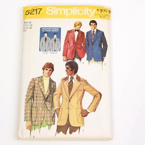 May include: A Simplicity sewing pattern for a blazer, pattern number 5217. The pattern includes instructions for making a long or regular length blazer. The pattern is for size 44, chest 44, waist 39. The pattern shows three different blazer styles: a red blazer, a blue blazer, and a plaid blazer.