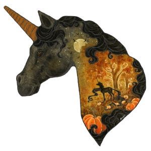 May include: A watercolor painting of a unicorn head with a detailed interior scene. The unicorn has a dark gray coat, a golden horn, and black flowing mane. The interior scene features a night sky, a full moon, a tree, and pumpkins.