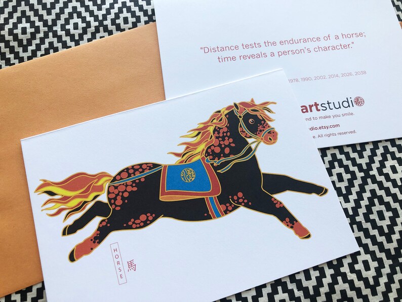 May include: A black and orange horse with a yellow mane and tail, running to the right. The horse is wearing a blue and gold saddle with a Chinese character on it. The image is on a white background with the words "HORSE" and "馬" written below the horse.