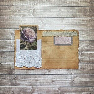May include: A vintage-style paper with a lace border and a floral image of a purple rose. The paper has a distressed look and is perfect for scrapbooking or crafting.