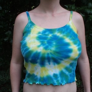 May include: A blue and yellow tie-dye tank top with a ruffled hem.