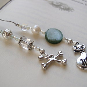 Night Huntress Bookmark Jeweled Beaded Book Thong in Teal Blue Green, Pearl, and Silver with Cat and Crossbones Charms image 3