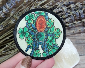 Lucky Chromatopelma cyaneopubescens with Clovers Patch - 2.25 inch Iron On / SEW ON Patch - Arachnid GBB Green Bottle Blue