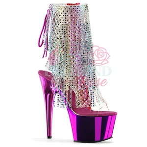 May include: A magenta platform sandal with a high stiletto heel. The shoe has a clear strap and a thick platform sole. The upper is embellished with a cascade of shimmering, iridescent fringe. The overall design is eye-catching and glamorous.
