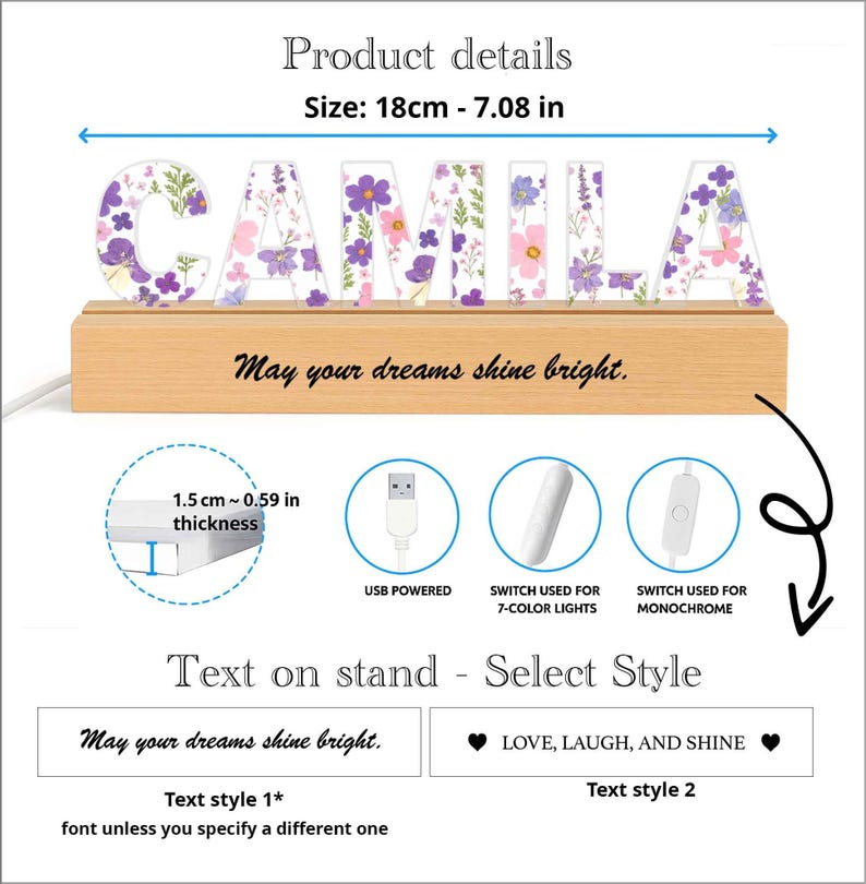 May include: A wooden base with the name "CAMILA" spelled out in individual letters. Each letter is filled with a floral design in shades of purple and pink. The base has the text "May your dreams shine bright." The light is USB powered and has a switch for 7-color lights or monochrome.
