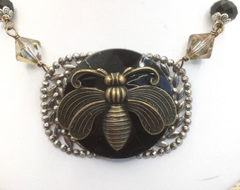Big brass bug necklace