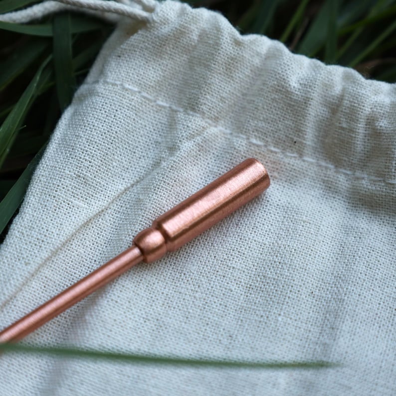 Eso World pure copper tongue scraper — traditional Ayurvedic oral care tool designed to remove buildup and support fresh breath naturally. Handcrafted from 100% pure copper for its antimicrobial and detoxifying properties. Durable, reusable, and fully recyclable alternative to plastic scrapers. Ideal for daily natural oral hygiene, zero-waste living, and holistic wellness routines. Part of Eso World’s premium eco-friendly essentials collection